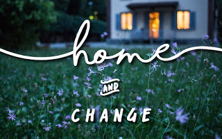 photo of a house at dusk with lights on, garden flowers in the foreground, text says Home and Change